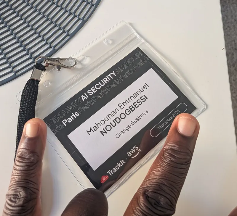 Event badge: AI Security Paris, TrackIt × AWS, 14 October 2026